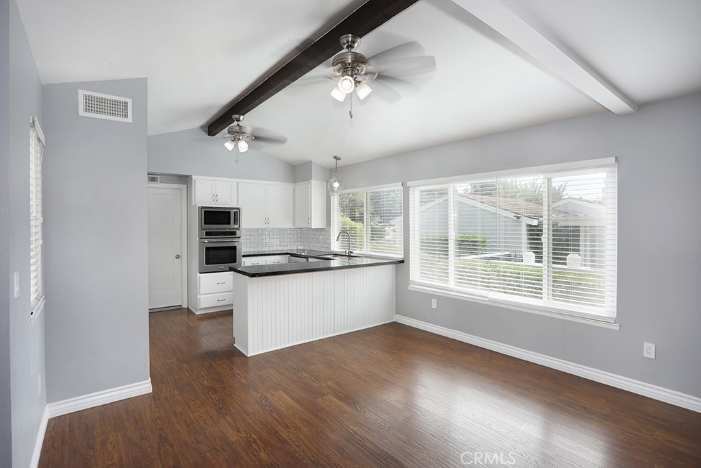 Living room to kitchen - 33031 Driftwood Ct, San Juan Capistrano CA 92675 - photo 4