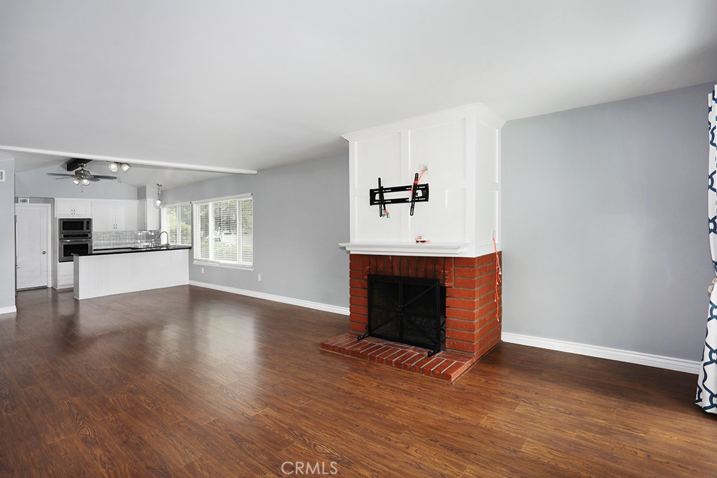 Living room with fireplace - 33031 Driftwood Ct, San Juan Capistrano CA 92675 - photo 14