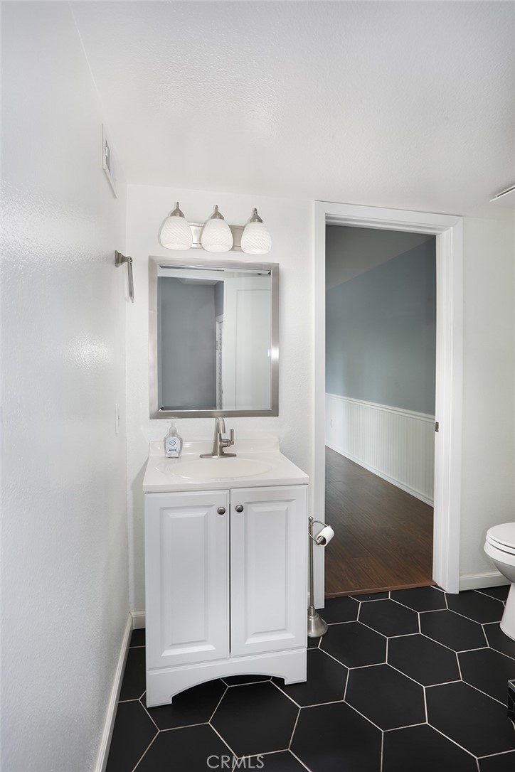 Downstairs bathroom - 33031 Driftwood Ct, San Juan Capistrano CA 92675 - photo 15
