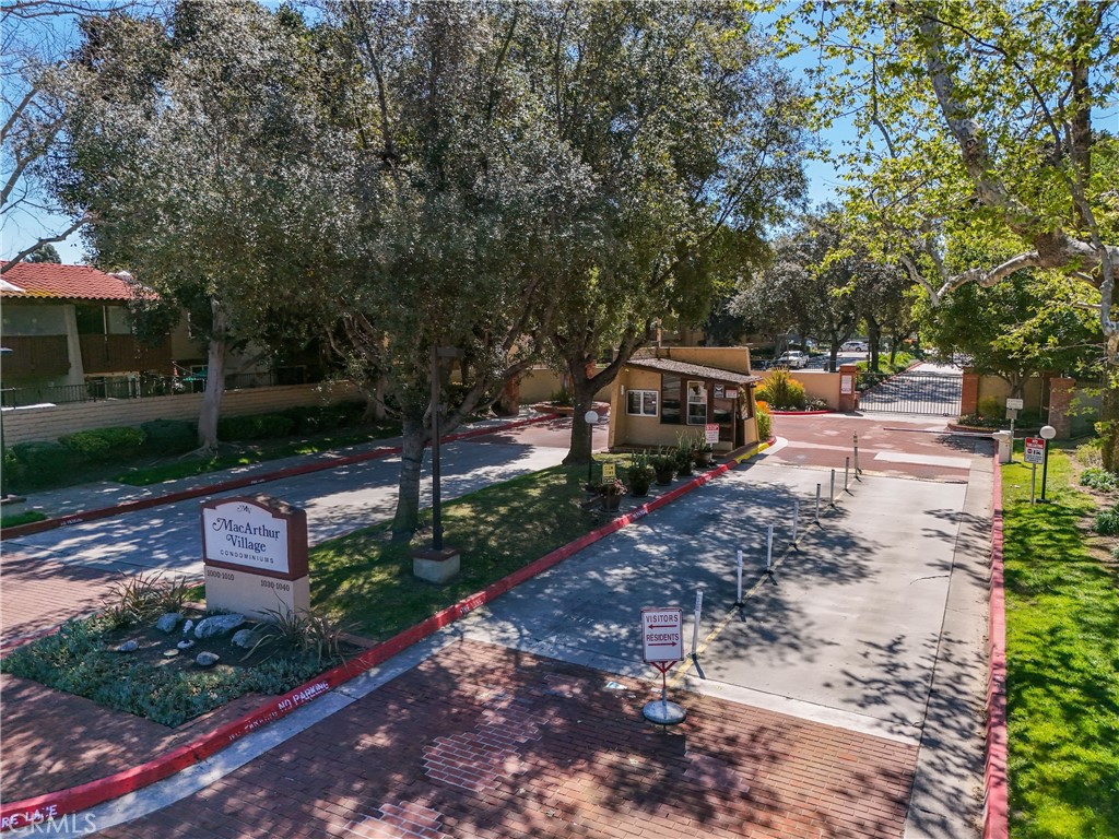 24 gate guarded security entry - 1010 W Macarthur Boulevard 77, Santa Ana CA 92707 - photo 7