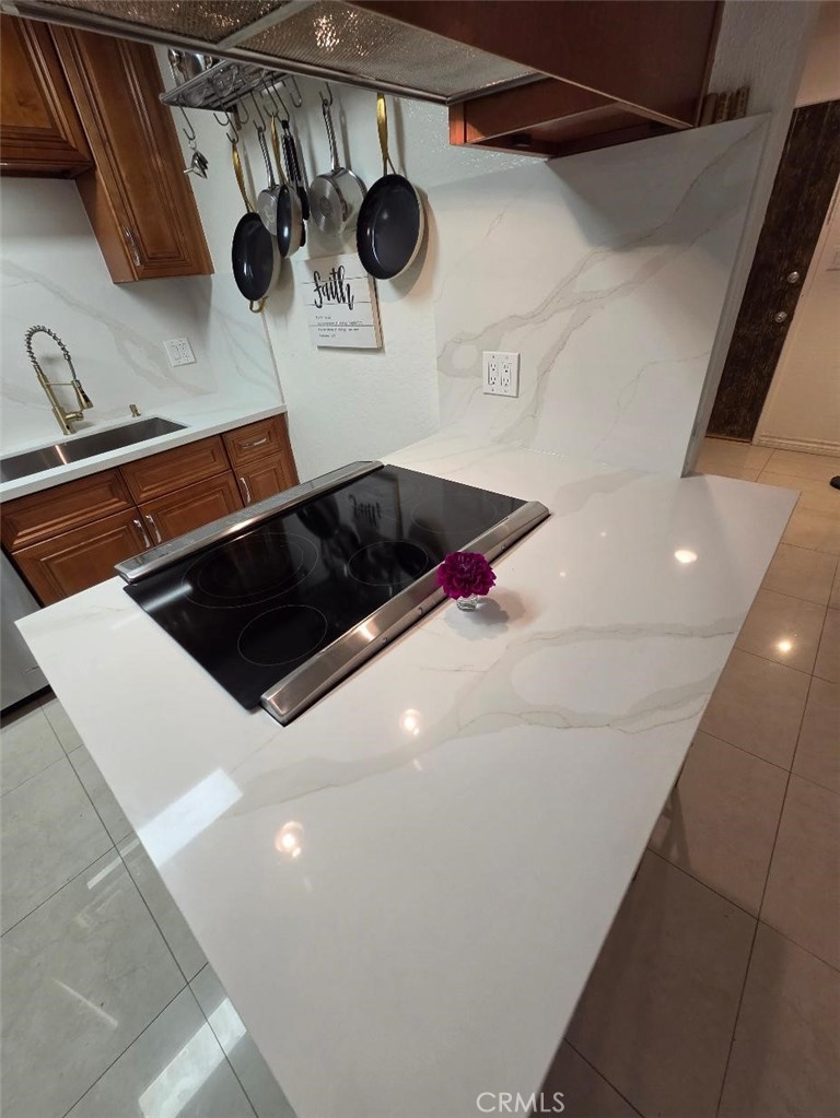 counter top height breakfast bar has room for 2 stools - 1010 W Macarthur Boulevard 77, Santa Ana CA 92707 - photo 10
