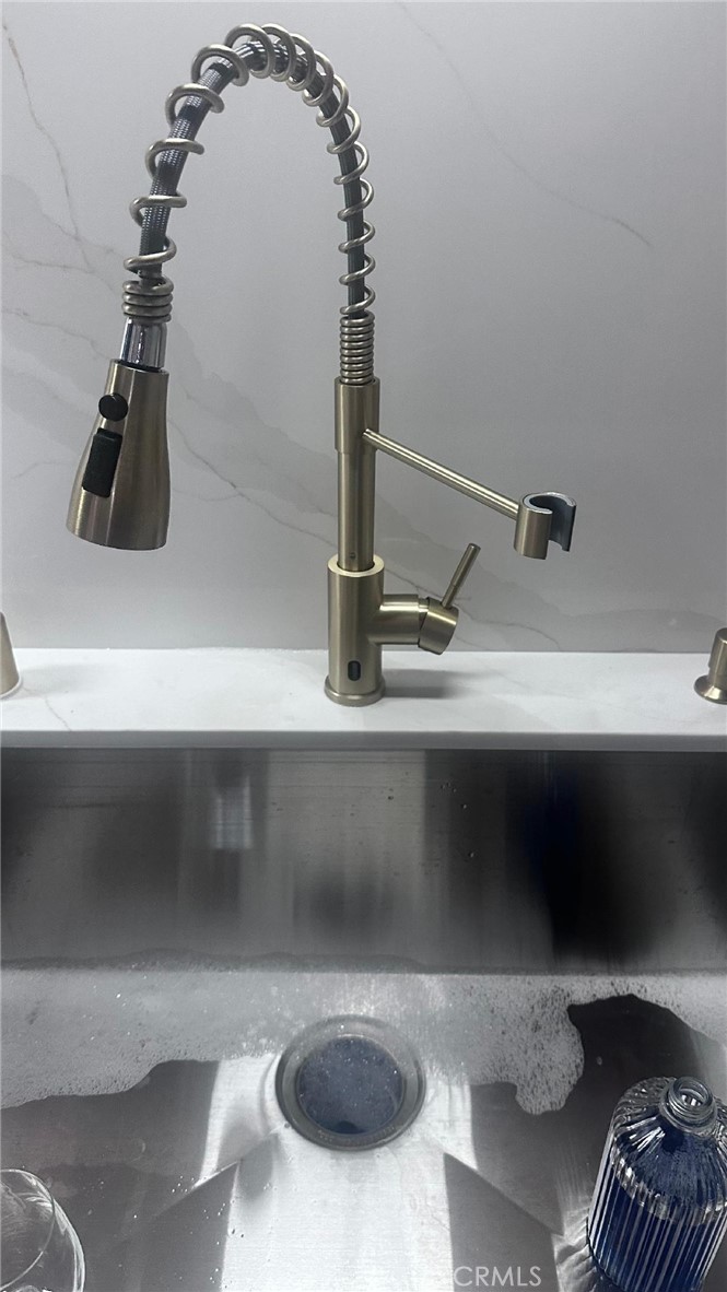 new pull away faucet - 1010 W Macarthur Boulevard 77, Santa Ana CA 92707 - photo 14