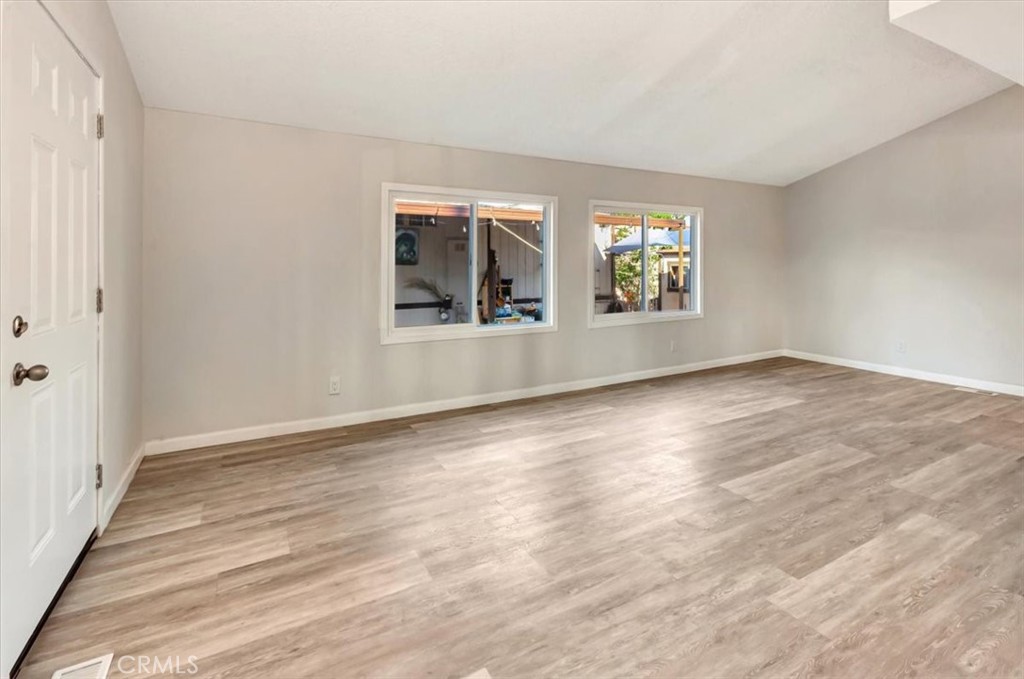 Living room are with beautiful upgraded windows - 105 Monaco, Santa Ana CA 92703 - photo 2
