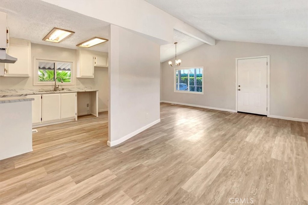 Open floor plan, view of dining, entrance and kitchen - simply beautiful - 105 Monaco, Santa Ana CA 92703 - photo 4