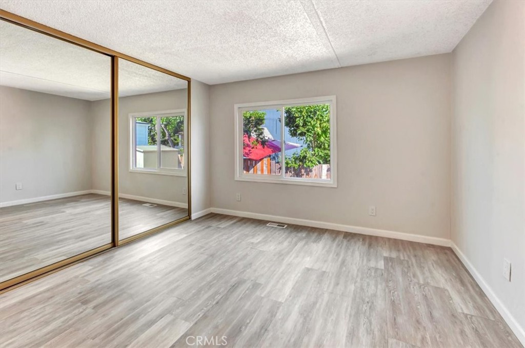 Master Bedroom with view of rear yard - 105 Monaco, Santa Ana CA 92703 - photo 7