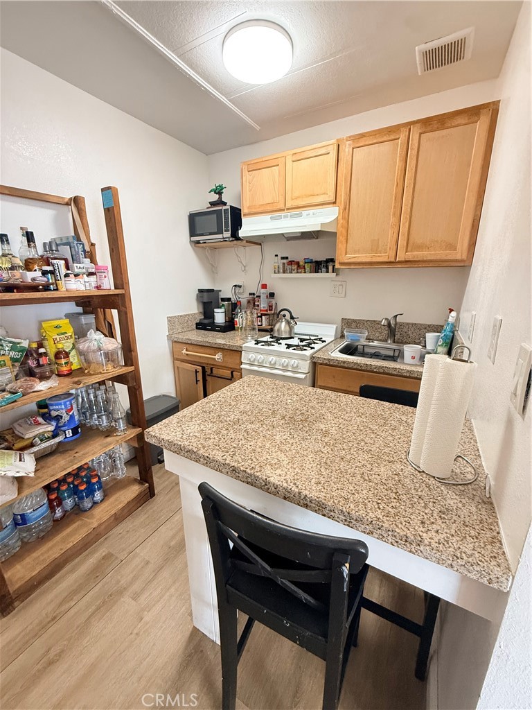 Unit 2 Kitchen - 107 Monaco 33, Santa Ana CA 92703 - photo 7