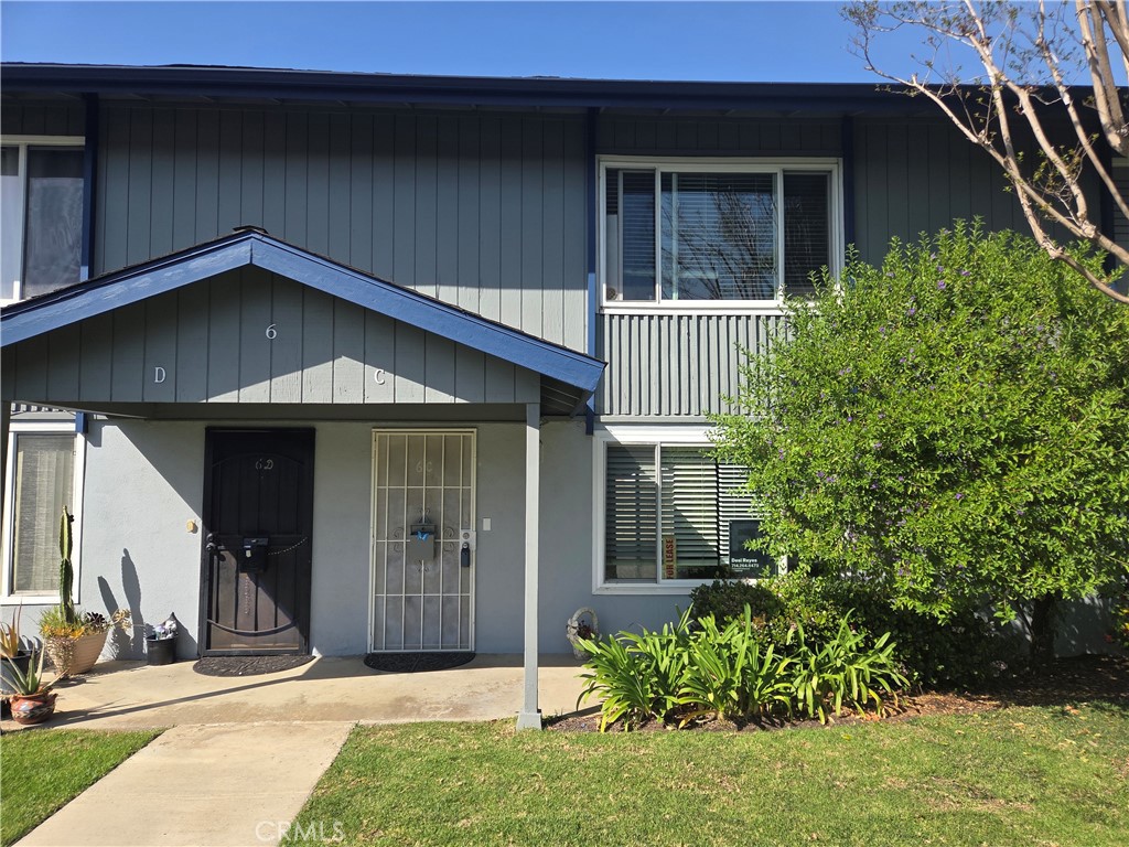 Front exterior view, unit features double pane windows, security door - 1107 W Memory Lane 6C, Santa Ana CA 92706 - photo 1