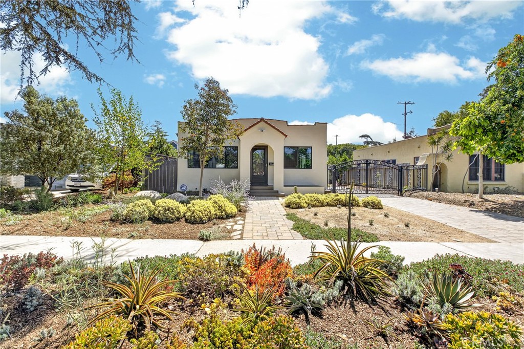 Nestled in the heart of the historic Wilshire Square neighborhood - 1341 S Garnsey Street, Santa Ana CA 92707 - photo 1