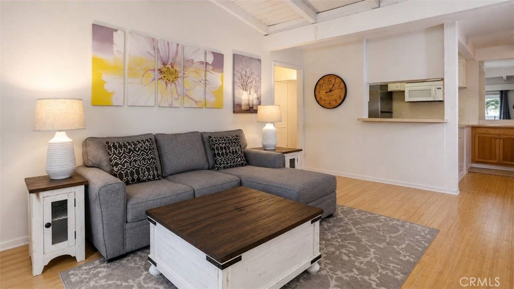 Living Room (AI ENHANCED) - 1345 Cabrillo Park Drive P-14, Santa Ana CA 92701 - photo 1