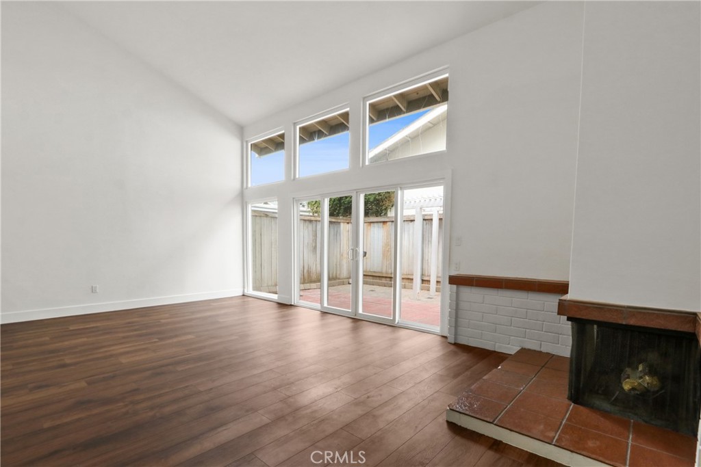 living room and fireplace - 1404 N Tustin P-3, Santa Ana CA 92705 - photo 4