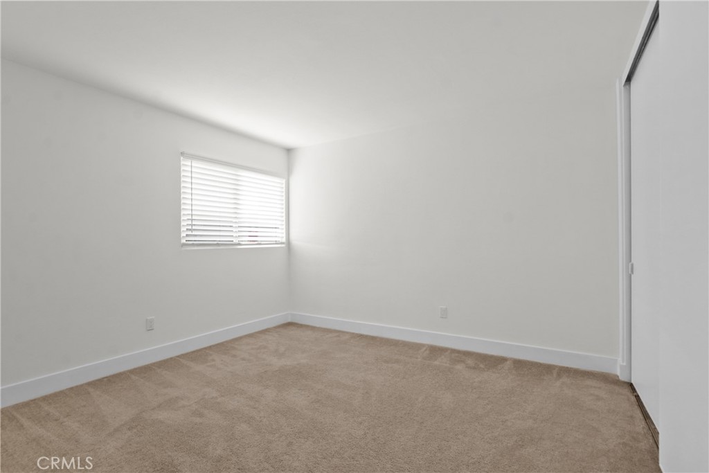 Entry level bedroom - 1404 N Tustin P-3, Santa Ana CA 92705 - photo 9