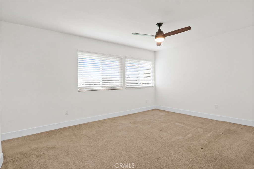 upstairs primary bedroom - 1404 N Tustin P-3, Santa Ana CA 92705 - photo 12