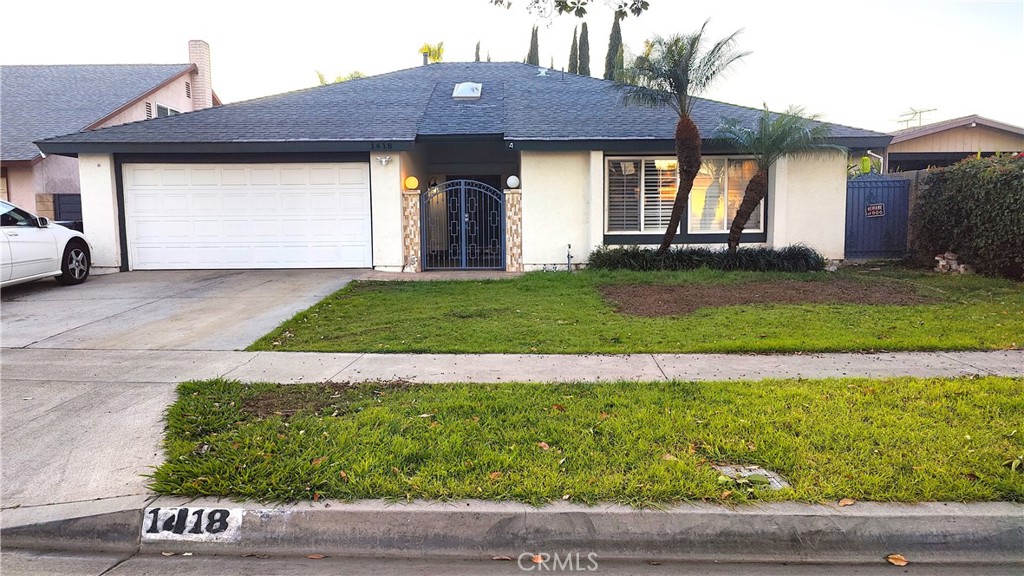 Good single family house with 2 car garage and driveway - 1418 N Glenarbor Street, Santa Ana CA 92706 - photo 1