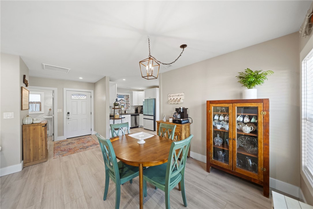 Dinning area with window facing back yard. - 1711 W 21st, Santa Ana CA 92706 - photo 9