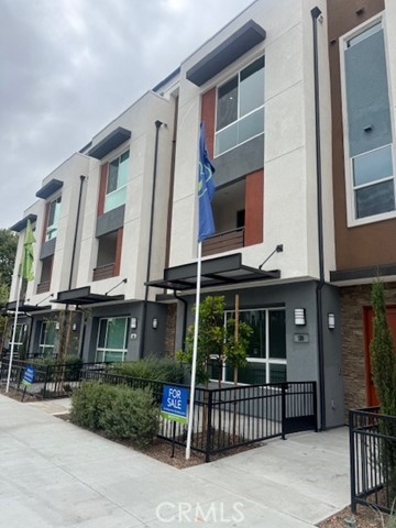 Modern clean lines oversized windows with an abundance of outside opportunities. City sky line and convenient freeway ac - 1818 E 1st Street 520, Santa Ana CA 92705 - photo 1