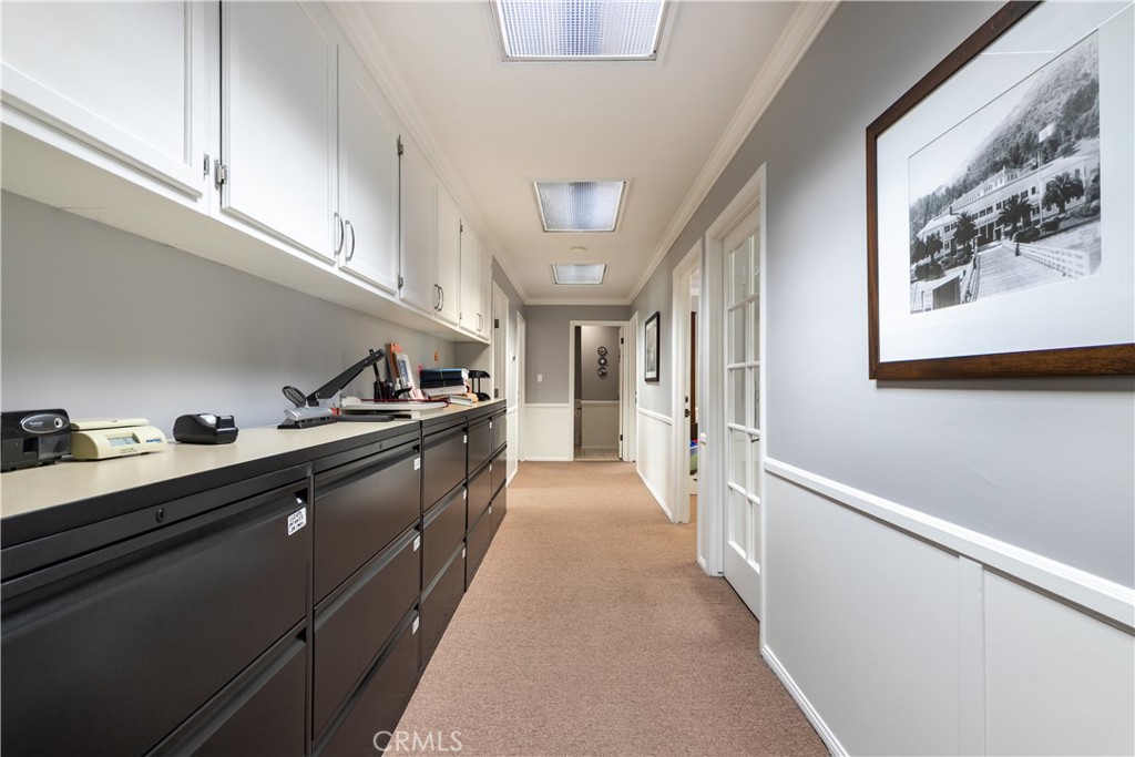 Inside hallway leading to all the offices, conference room and restroom for unit 204. - 1913 E 17th 204, Santa Ana CA 92705 - photo 14