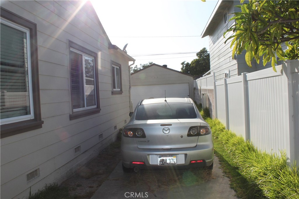 Driveway leading to the Garage - 1920 S Parton Street, Santa Ana CA 92707 - photo 13