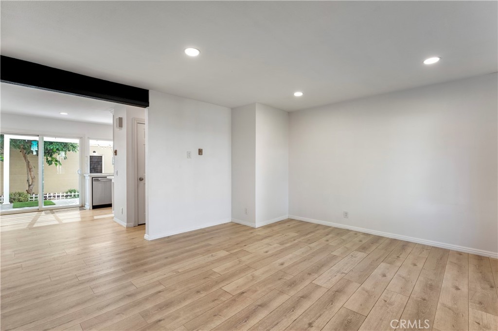 Living Room with LVP Flooring - 210 Carriage B, Santa Ana CA 92707 - photo 7