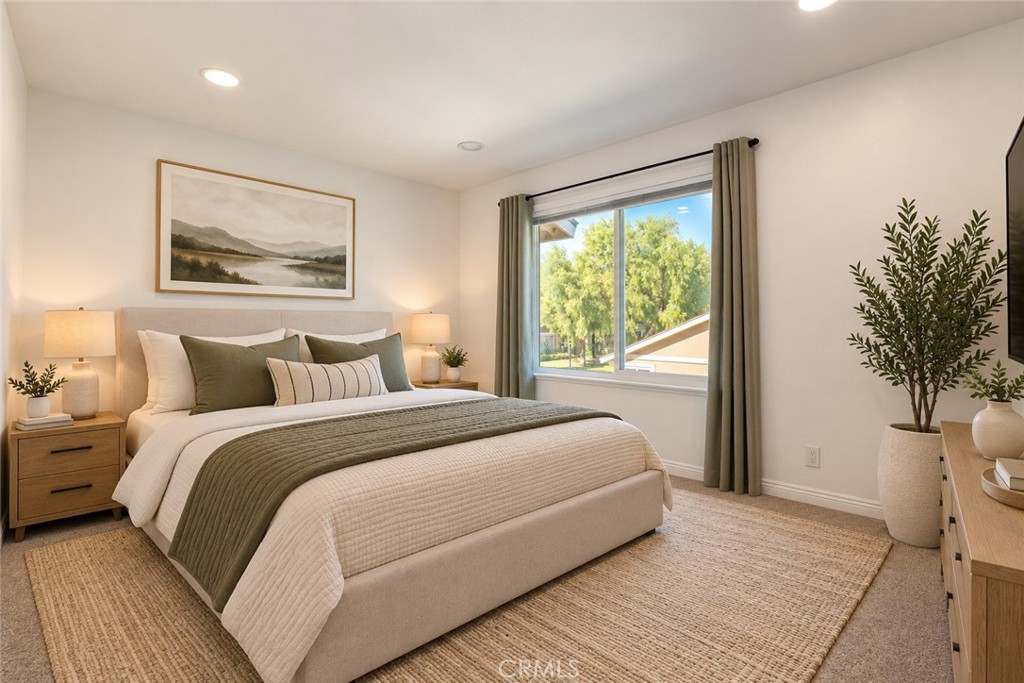 Virtually Staged Primary Bedroom - 210 Carriage B, Santa Ana CA 92707 - photo 23