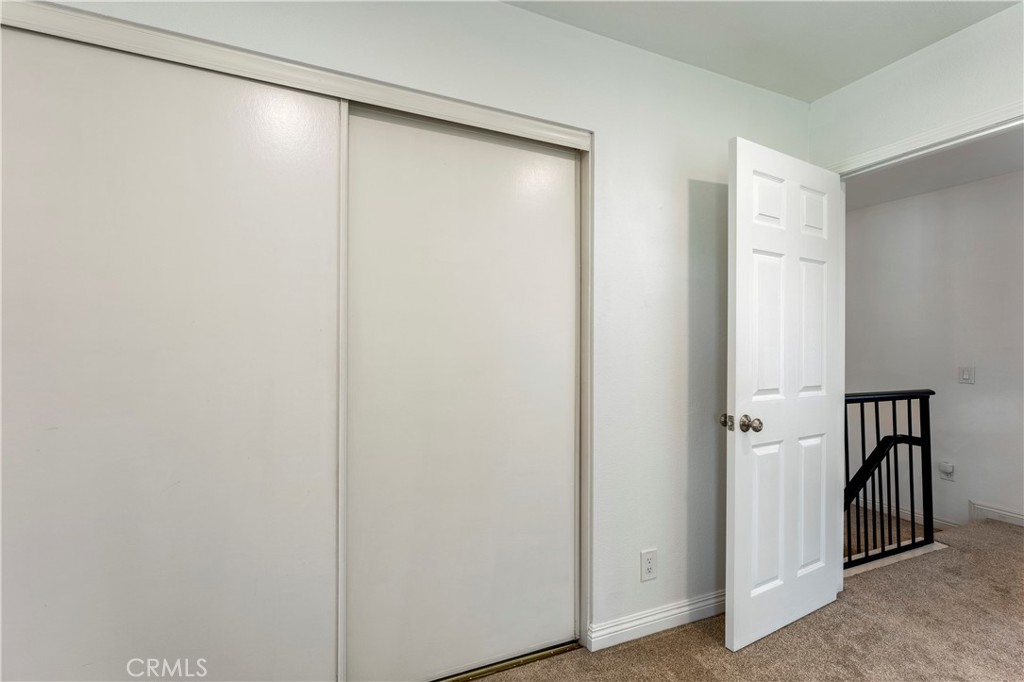 Primary Bedroom Closet - 210 Carriage B, Santa Ana CA 92707 - photo 25