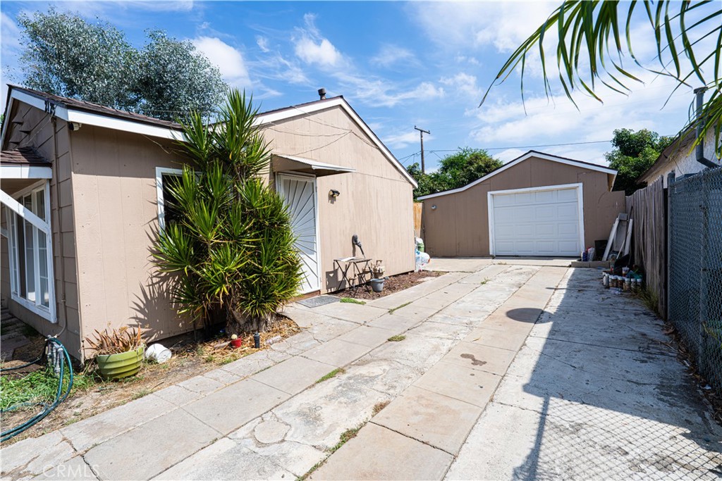 Side Entrance of Home + 1 Car Garage Entrance - 2125 Rousselle, Santa Ana CA 92707 - photo 2