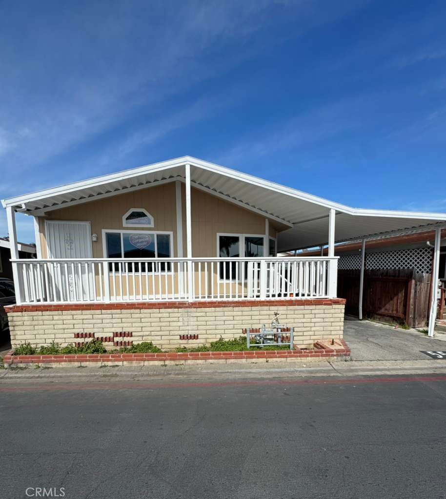 215 S Sullivan Lane 109, Santa Ana CA 92704 - photo 1
