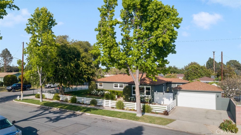 Corner lot with lots of street parking and a double wide driveway. - 2327 Larchmont Avenue, Santa Ana CA 92706 - photo 1