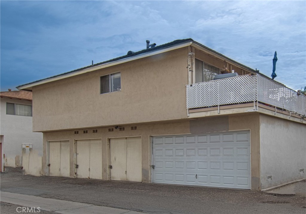 Rear Exterior - Garaging for 4 cars with individual laundry in each garage - 2731 W Orion Avenue, Santa Ana CA 92704 - photo 21
