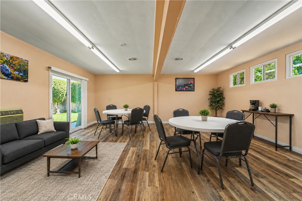 Virtually staged community rec. room. - 2767 W 1st Street 14, Santa Ana CA 92703 - photo 16