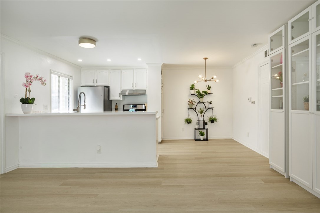 Open Floor plan to the dining/kitchen area - 2815 S Fairview G, Santa Ana CA 92704 - photo 4