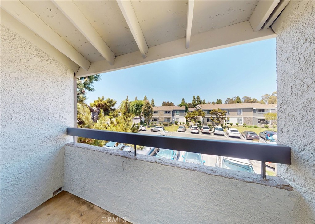 Balcony with no obstruction of view offering privacy and natural lighting into the home. - 2835 S Fairview H, Santa Ana CA 92704 - photo 18