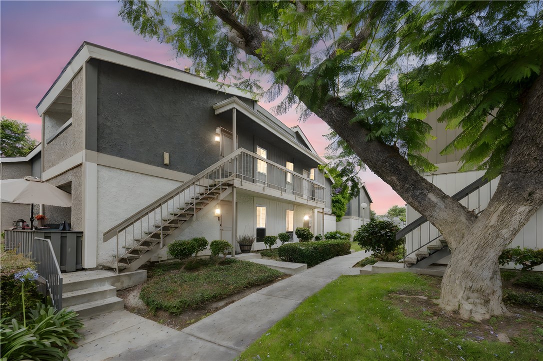 Upstairs corner unit with a private balcony. - 2849 S Fairview Street H, Santa Ana CA 92704 - photo 1