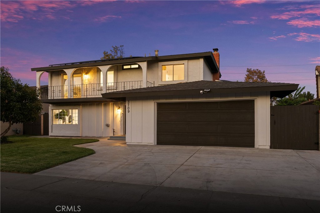 Front image of house just after sunset - 3709 S Olive Street, Santa Ana CA 92707 - photo 6