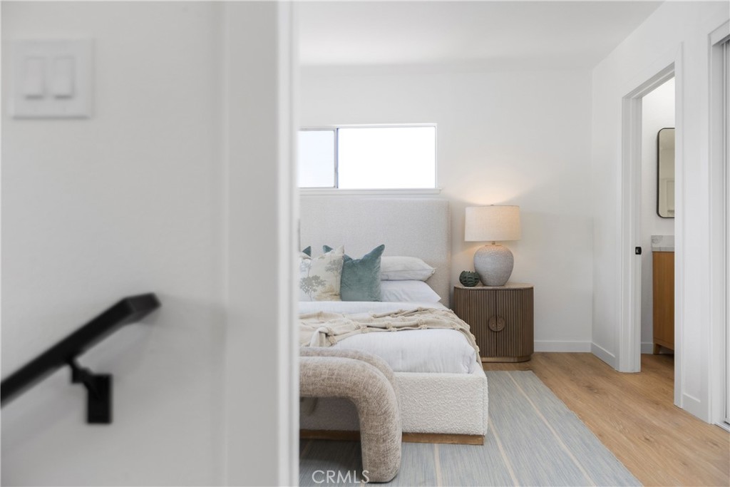Primary bedroom with private bathroom and direct access to uppder deck - 3709 S Olive Street, Santa Ana CA 92707 - photo 31