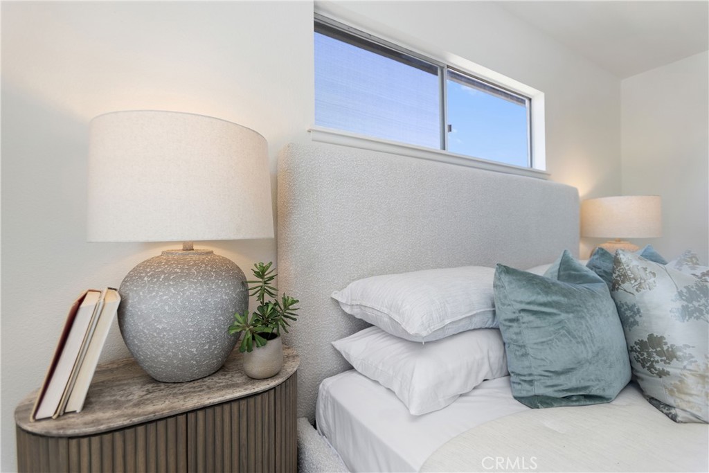 Primary bedroom with private bathroom and direct access to uppder deck - 3709 S Olive Street, Santa Ana CA 92707 - photo 32