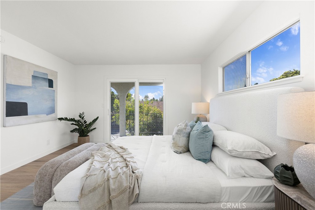 Primary bedroom with private bathroom and direct access to uppder deck - 3709 S Olive Street, Santa Ana CA 92707 - photo 35