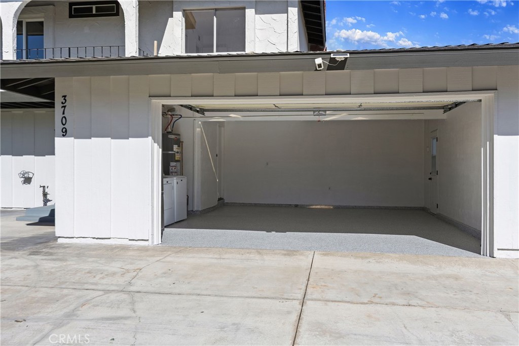 Large 2 car garage with new epoxy floor and laundry hookups - 3709 S Olive Street, Santa Ana CA 92707 - photo 53