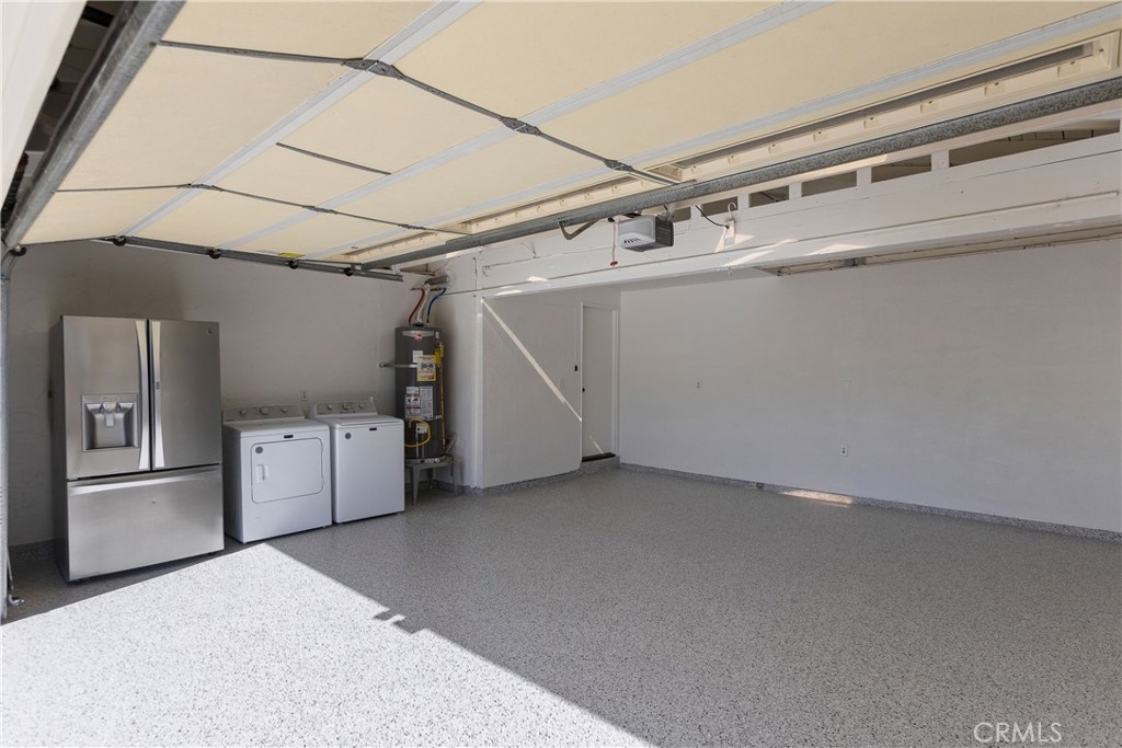 Large 2 car garage with new epoxy floor and laundry hookups - 3709 S Olive Street, Santa Ana CA 92707 - photo 54