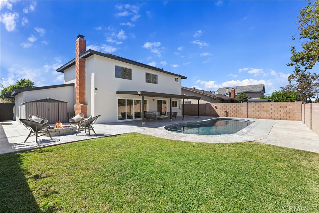 Grassy backyard and saltwater swimming pool - 3709 S Olive Street, Santa Ana CA 92707 - photo 60
