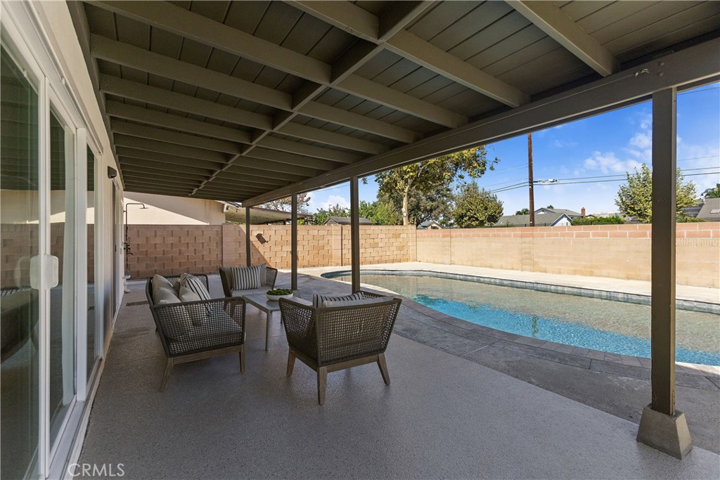 Covered outdoor patio with new epoxy floor - 3709 S Olive Street, Santa Ana CA 92707 - photo 63