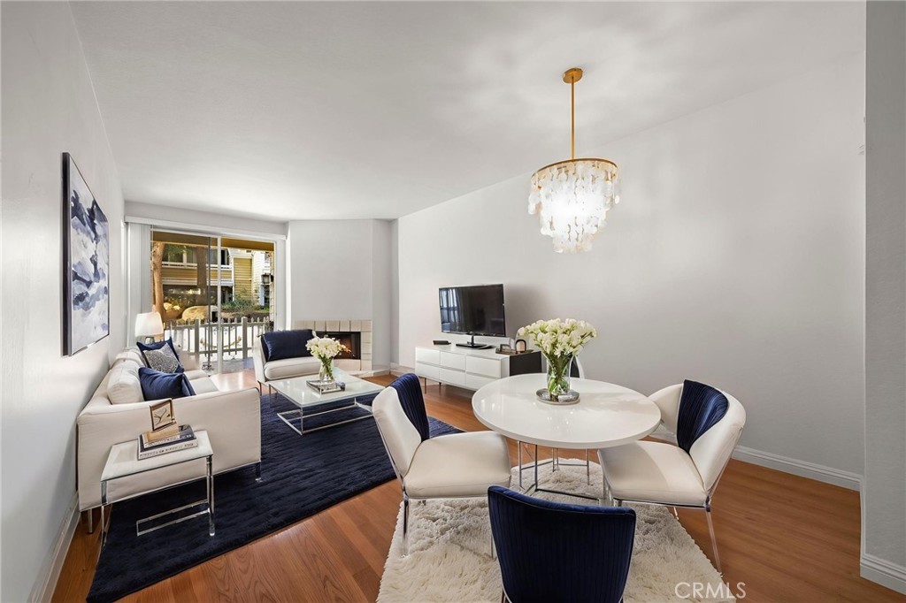 Living room virtually staged - 3750 S Bear Street L183, Santa Ana CA 92704 - photo 1