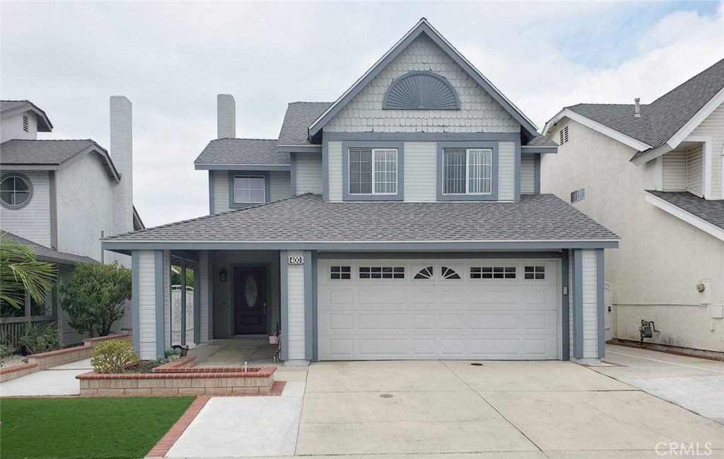 Front exterior — two-story with attached garage - 400 North Lisabeth, Santa Ana CA 92703 - photo 2