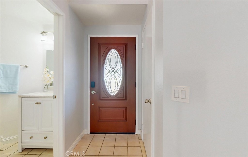 Front entry with decorative glass door - 400 North Lisabeth, Santa Ana CA 92703 - photo 5