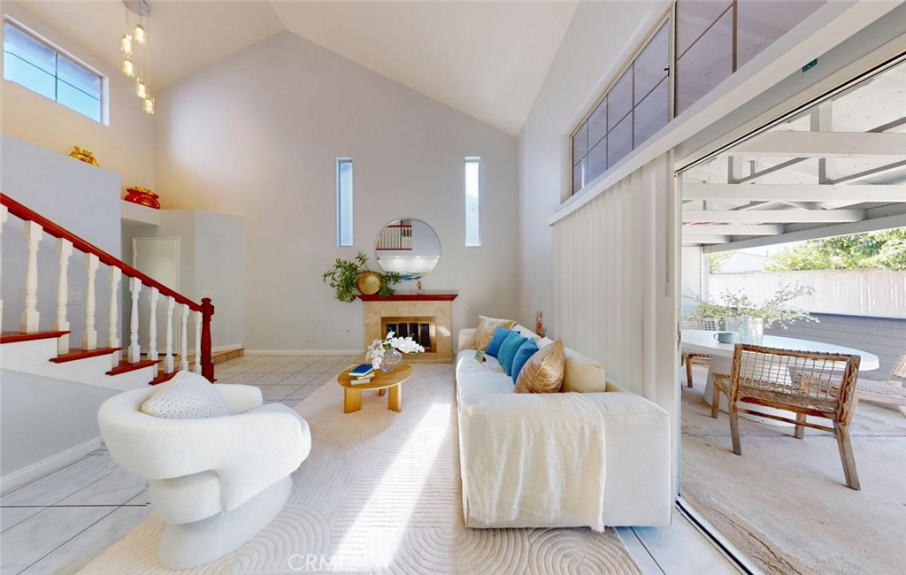 Living room opens to covered patio — indoor-outdoor flow - 400 North Lisabeth, Santa Ana CA 92703 - photo 9