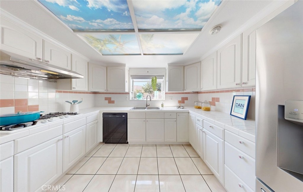 Kitchen — U-shaped with skylights - 400 North Lisabeth, Santa Ana CA 92703 - photo 12