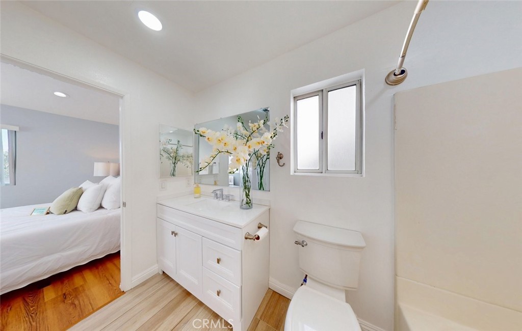 Primary en-suite bathroom with quartz vanity - 400 North Lisabeth, Santa Ana CA 92703 - photo 16