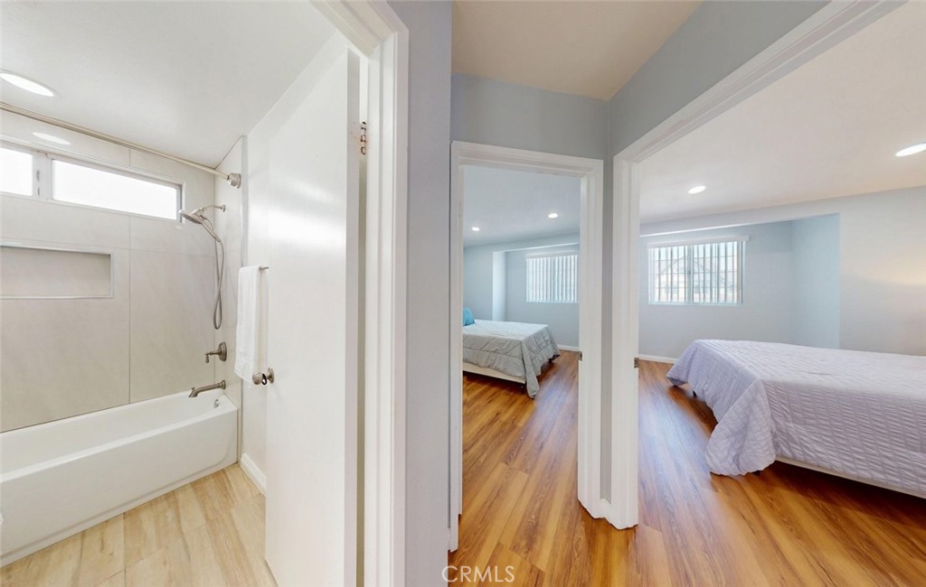 Upstairs hallway, Full bath and secondary bedrooms - 400 North Lisabeth, Santa Ana CA 92703 - photo 17