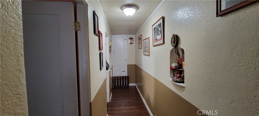 Hallway to bedrooms and bathrooms - 502 E Wellington Avenue, Santa Ana CA 92701 - photo 5