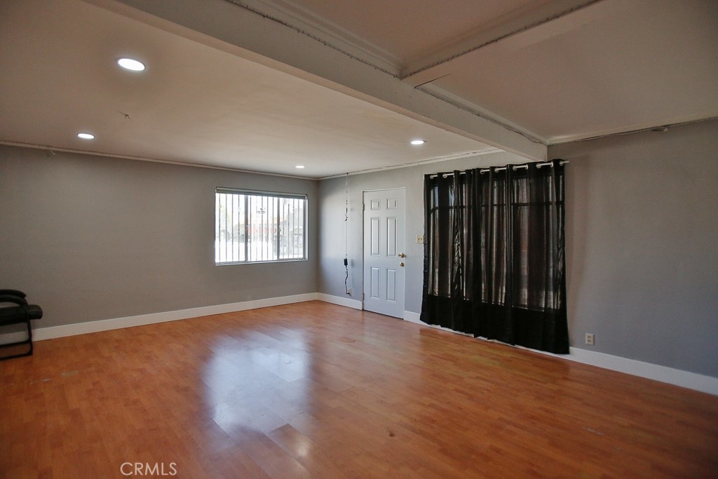 504 - LIVING ROOM - NEW FLOORING AND RECENTLY PAINTED - 502 W 17th Street, Santa Ana CA 92706 - photo 6