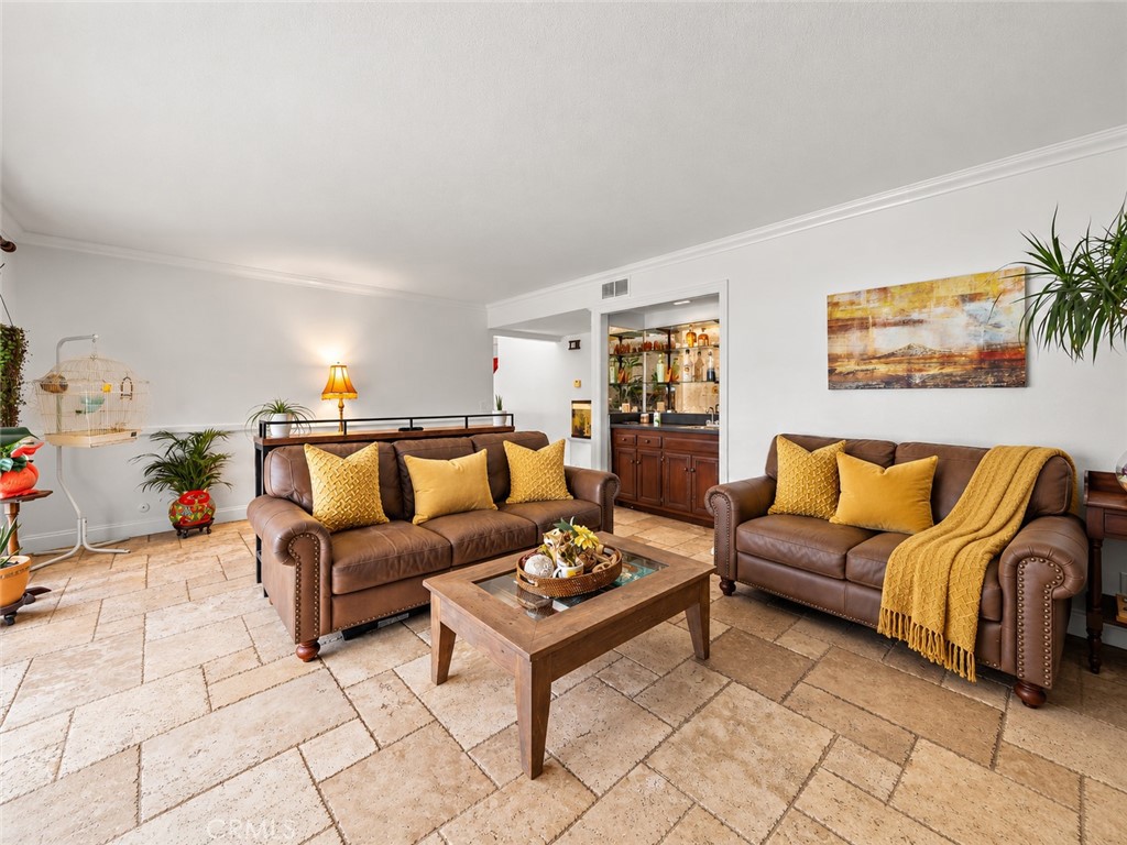 Fabulous Family Room with Wet Bar, Fireplace, and Travertine Flooring - 622 W Alpine Avenue, Santa Ana CA 92707 - photo 16